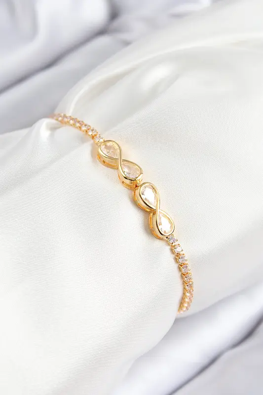 Pirinç Zirkon Taşlı Sonsuzluk Model Gold Renk Asansörlü Kadın Bileklik